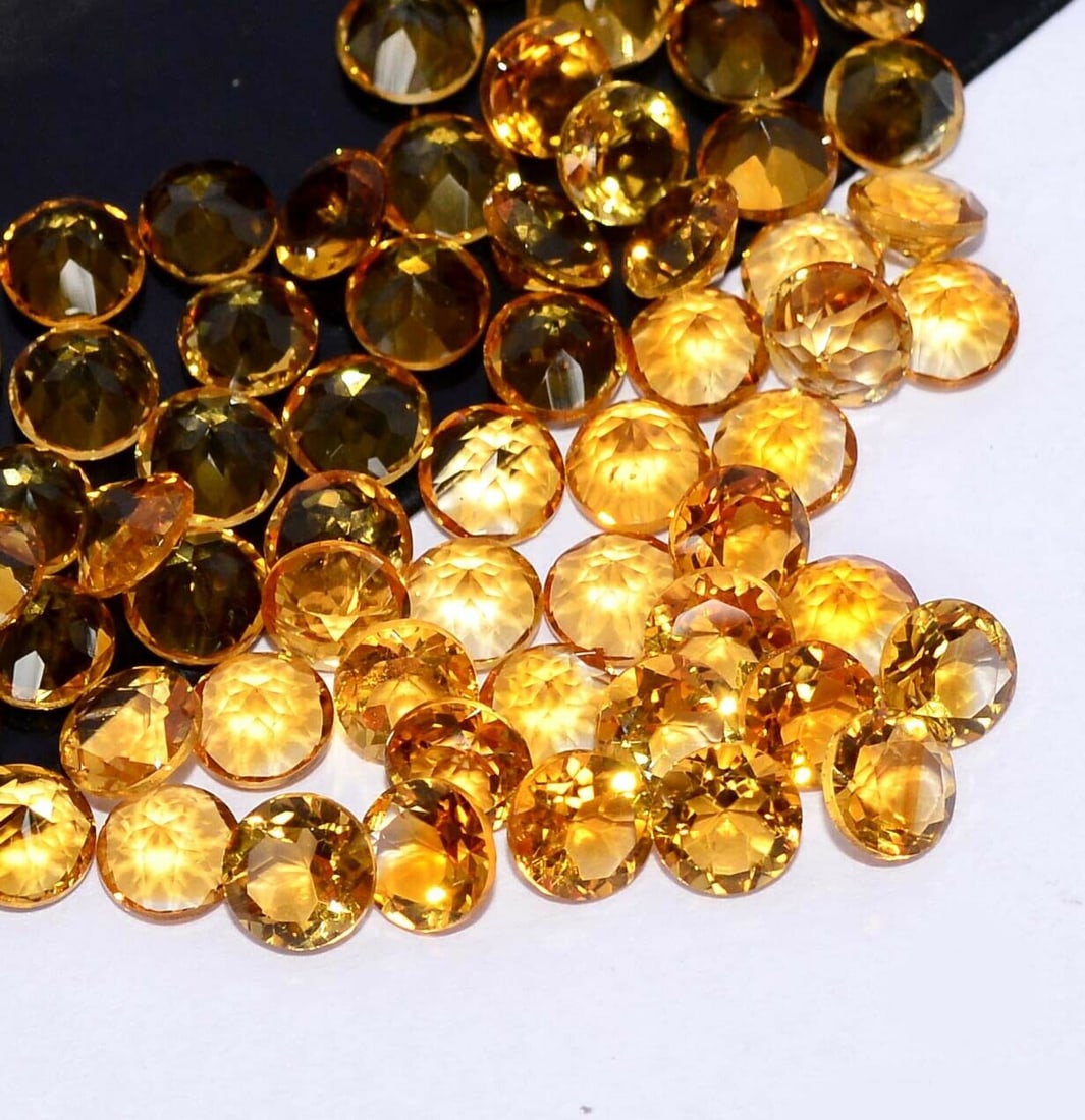 Citrine 5 MM Round Faceted Cut 50 Pieces: Natural Citrine 5 MM Round Faceted Cut 50 Pieces Gemstone : Citrine Shape : Round Size : 5 MM Color : Yellow Type : Faceted Cut Quantity : 50 Pieces Weight : 24 Carats<