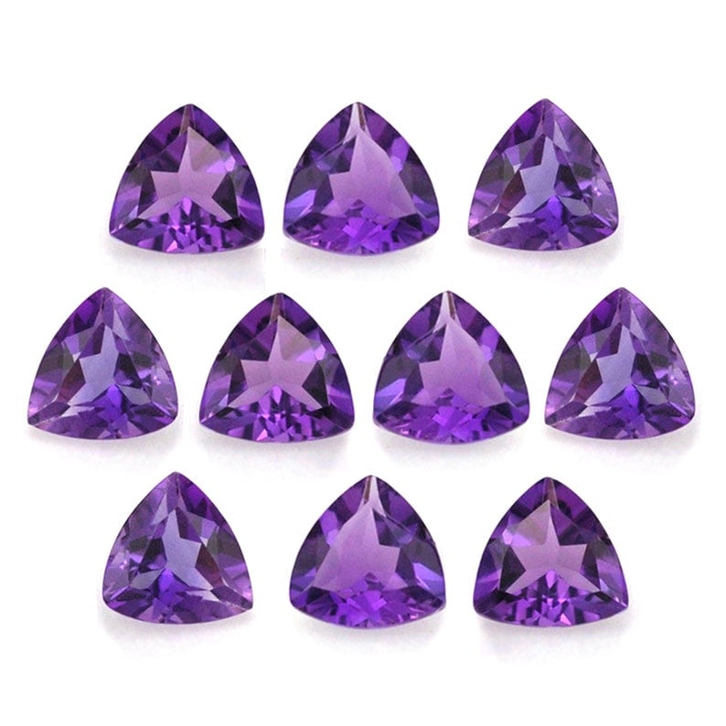 Amethyst 8 MM Trillion Faceted Cut 10 Pieces: Natural Amethyst 8 MM Trillion Faceted Cut 10 Pieces Gemstone : Amethyst Shape : Trillion Size : 8 MM Color : Purple Type : Faceted Cut Quantity : 10 Pieces Weight : 15