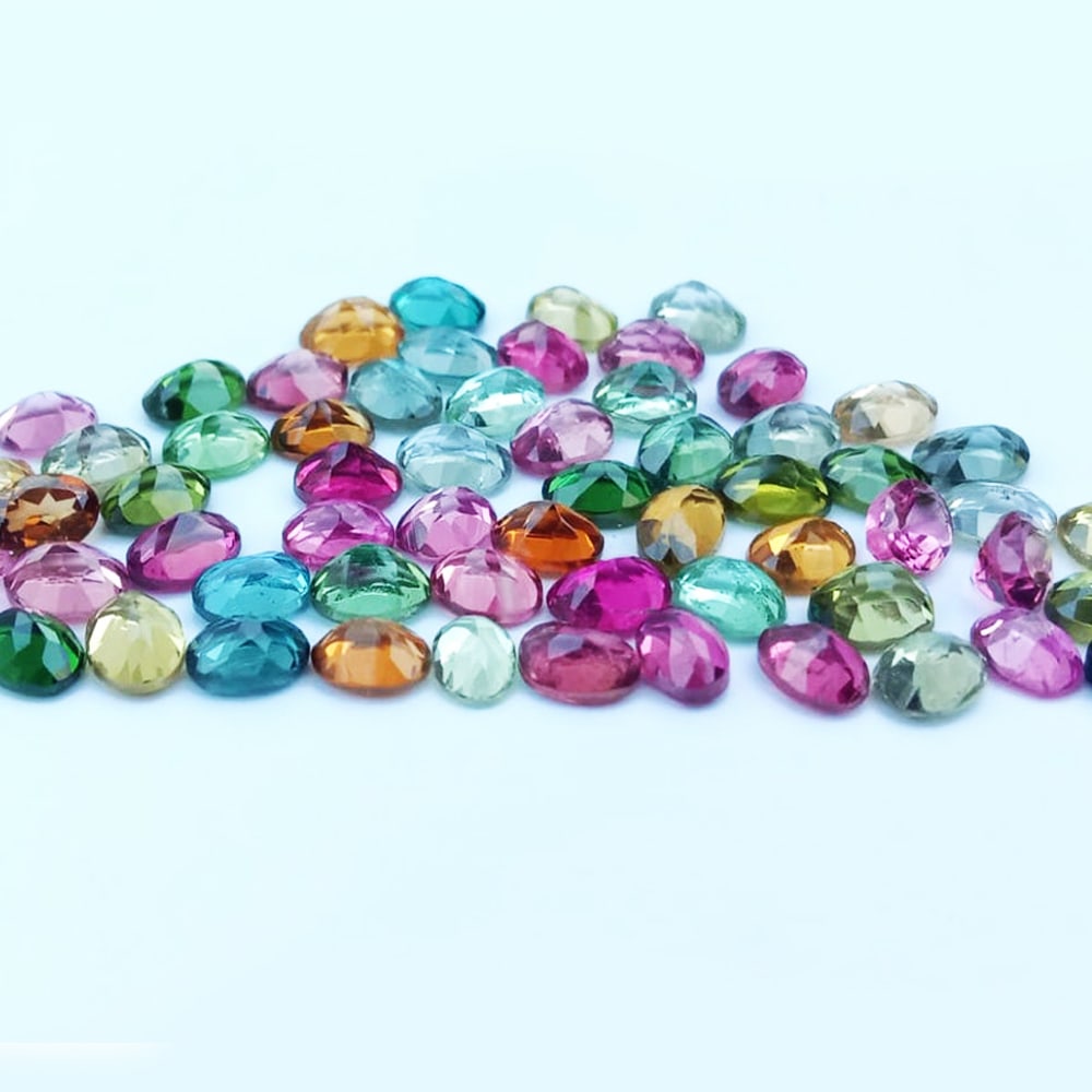 Multi Tourmaline 5x4 MM Oval Faceted Cut 50 Pieces: Natural Multi Tourmaline 5x4 MM Oval Faceted Cut 50 Pieces Gemstone : Multi Tourmaline Shape : Oval Size : 5x4 MM Color : Multi Color Type : Faceted Cut Quantity : 50 Pieces <