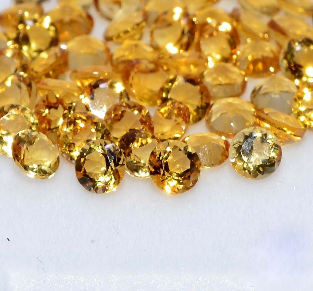Citrine 3 MM Round Faceted Cut 200 Pieces: Natural Citrine 3 MM Round Faceted Cut 200 Pieces Gemstone : Citrine Shape : Round Size : 3 MM Color : Yellow Type : Faceted Cut Quantity : 200 Pieces Weight : 19.80 Ca