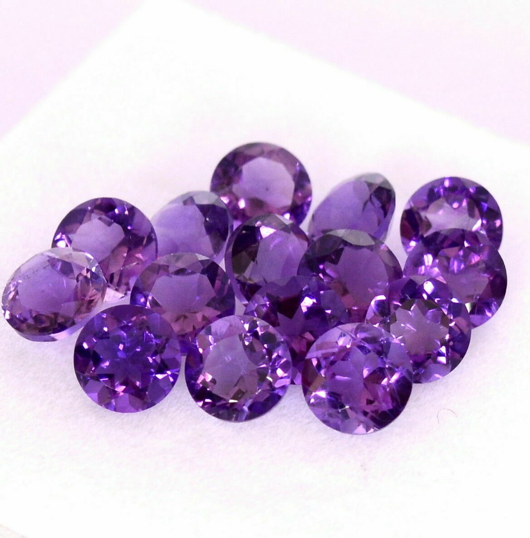 Amethyst 7 MM Round Faceted Cut 50 Pieces: Natural Amethyst 7 MM Round Faceted Cut 50 Pieces Gemstone : Amethyst Shape : Round Size : 7 MM Color : Purple Type : Faceted Cut Quantity : 50 Pieces Weight : 62.50 Ca