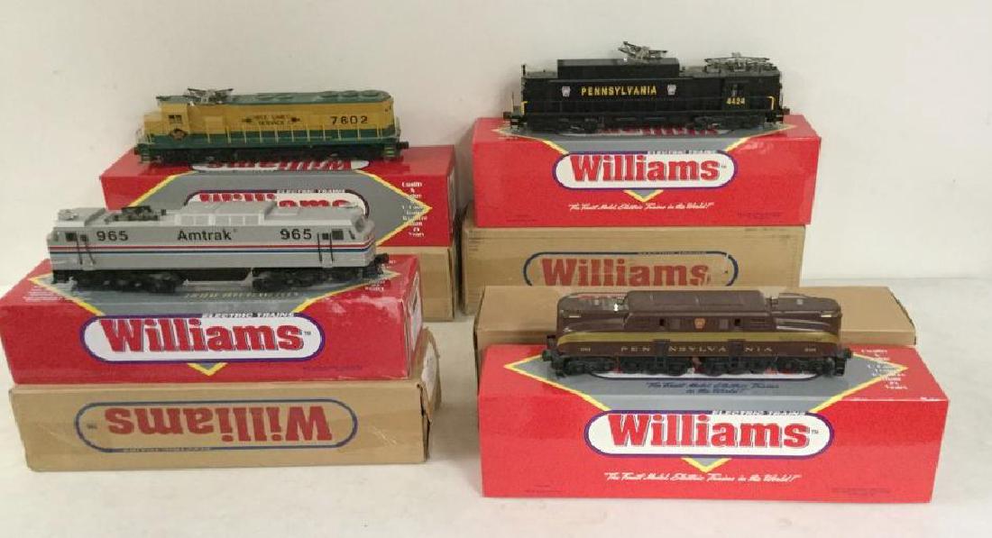(4) WILLIAMS TRAINS WITH BOXES, THEY WERE TAKEN OUT, IN: (4) WILLIAMS TRAINS WITH BOXES, THEY WERE TAKEN OUT, IN AS FOUND ESTATE CONDITION, FROM SAME ESTATE AS OTHER TOYS & TRAINS. INCLUDED IS E-60 LOCOMOTIVE AMTRAK CAB 965, SD45-211 LOCOMOTIVE READING CAB 