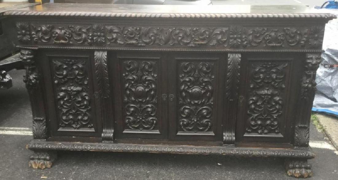 HEAVILY CARVED OAK SIDEBOARD W/LION HEADS, CLAW FEET, (1 of 4)