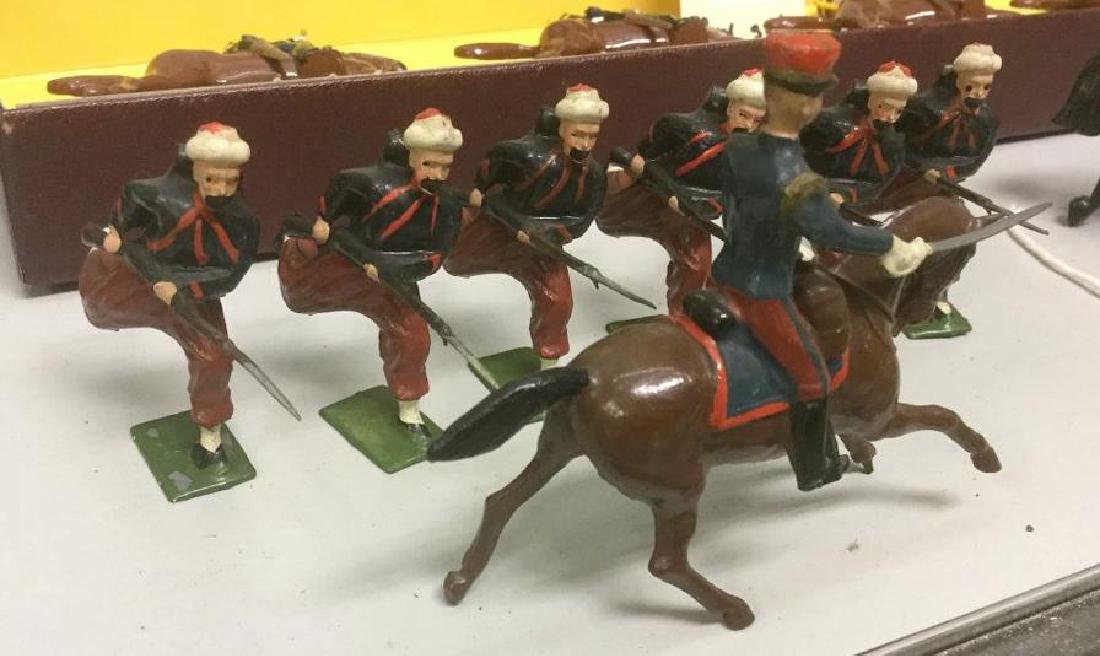 BRITAINS SOLDIERS- 7 PCS FRENCH ZOUAVES CHARGING: BRITAINS SOLDIERS- 7 PCS FRENCH ZOUAVES CHARGING INCLUDING MOUNTED OFFICER, WITH 1 ORIGINAL BOX, FROM KINGSTON NY COLLECTOR FROM WHEN HE WAS A CHILD, IN AS FOUND CONDITION