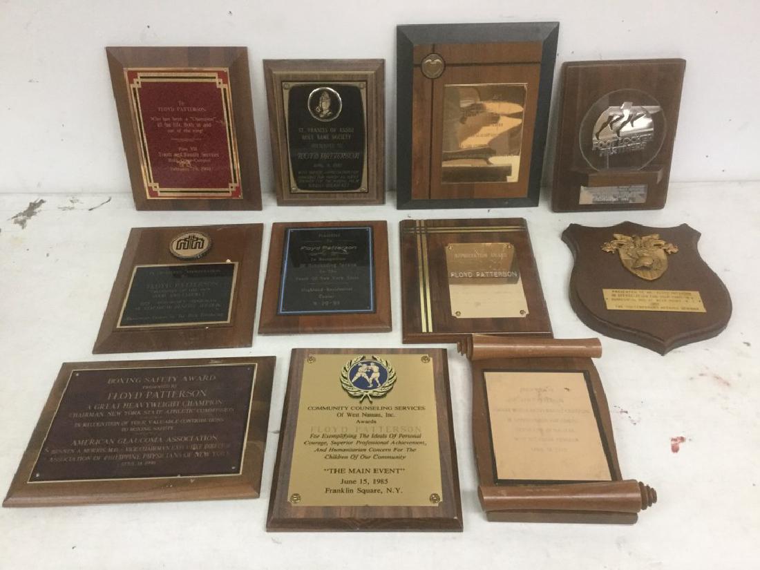 FLOYD PATTERSON ESTATE - 11 AWARD AND RECOGNITION: FLOYD PATTERSON ESTATE - 11 AWARD AND RECOGNITION PLAQUES FROM 1979 TO 1996, INCL. AMER HEART ASSOC., WEST POINT AND FOOT LOCKER FROM HIS NEW PALTZ, NY HOME