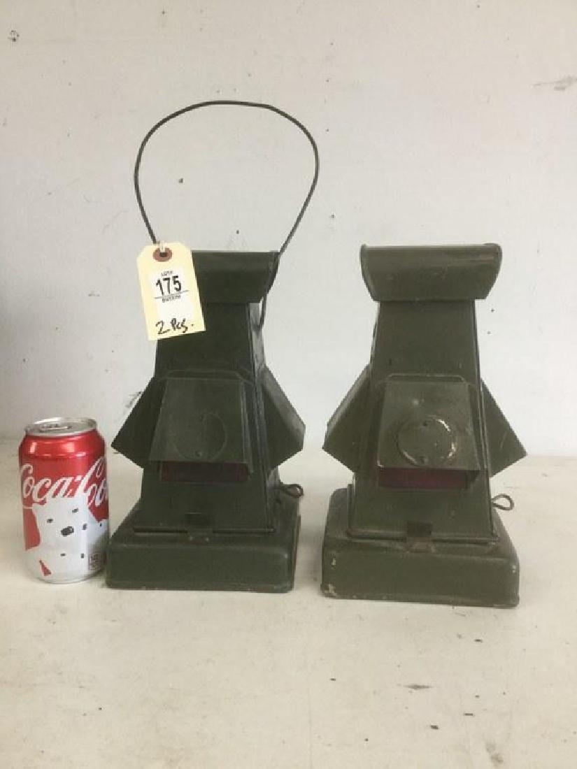2 "MILITARY" LANTERNS - RED GLASS, BURNERS INTACT, ONE: 2 "MILITARY" LANTERNS - RED GLASS, BURNERS INTACT, ONE HANDLE MISSING, MEASURES 10-1/2" HIGH FROM THE NEW KINGSTON, NY ESTATE COLLECTION