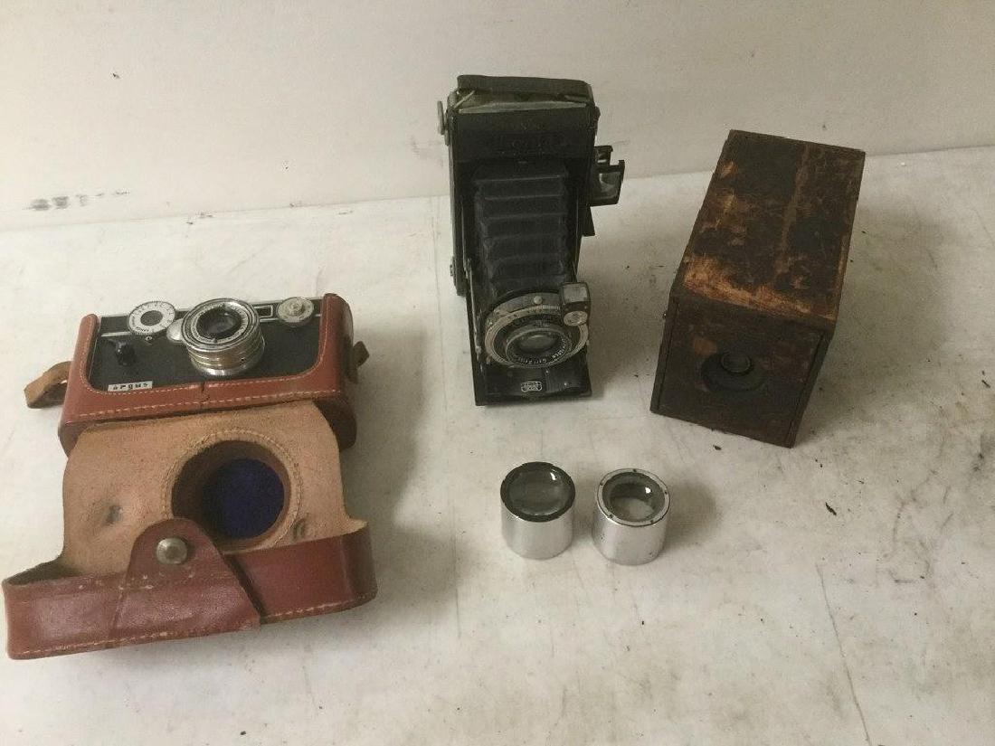 3 CAMERAS & A FEW LENSES. INCLUDES ARGUS CAMERA IN (1 of 10)