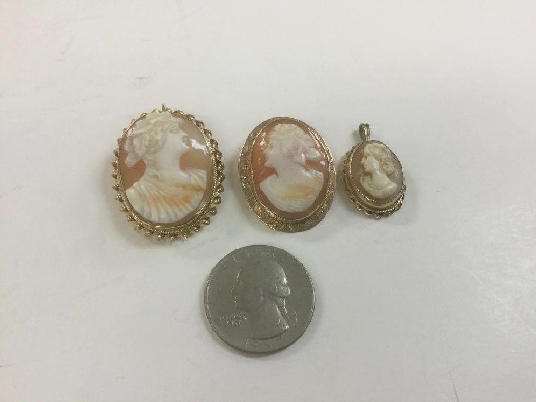 (3) OLD CAMEOS (2) MARKED 14K & MIDDLE SIZED ONE IS: (3) OLD CAMEOS (2) MARKED 14K & MIDDLE SIZED ONE IS MARKED 10K. NICE ESTATE CONDITION.