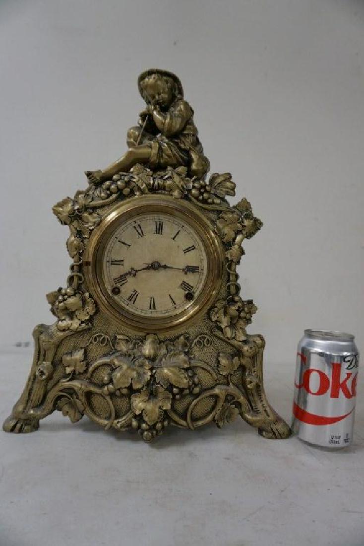 NOVELTY MANTEL CLOCK WITH YOUNG BOY SEATED ON TOP, (1 of 4)