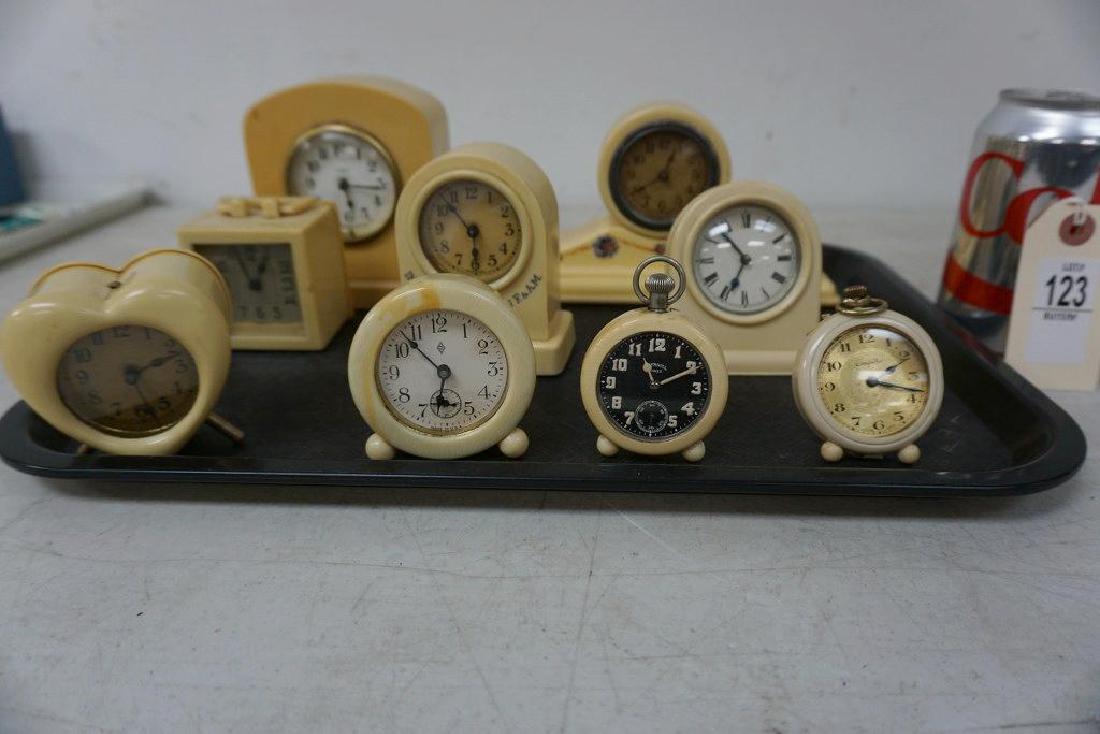 LOT OF 9 CELLULOID CLOCKS, DIFFERENT SHAPES AND SIZES, (1 of 5)