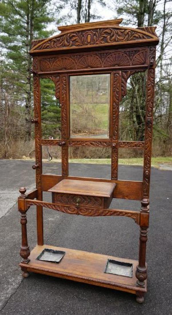 CARVED OAK HALL TREE W/UMBRELLA STANDS & MIRROR,