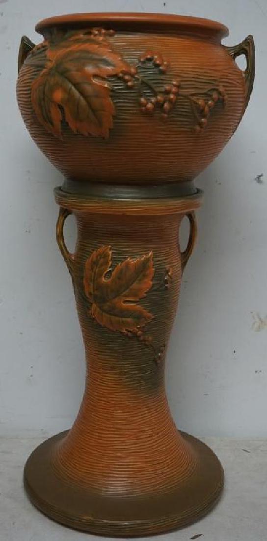 ROSEVILLE BUSHBERRY JARDINAIRE AND PEDESTAL, BOWL HAS: ROSEVILLE BUSHBERRY JARDINAIRE AND PEDESTAL, BOWL HAS HAIRLINE CRACK IN ONE SPOT, MEASURES 31" HIGH, AS PICTURED