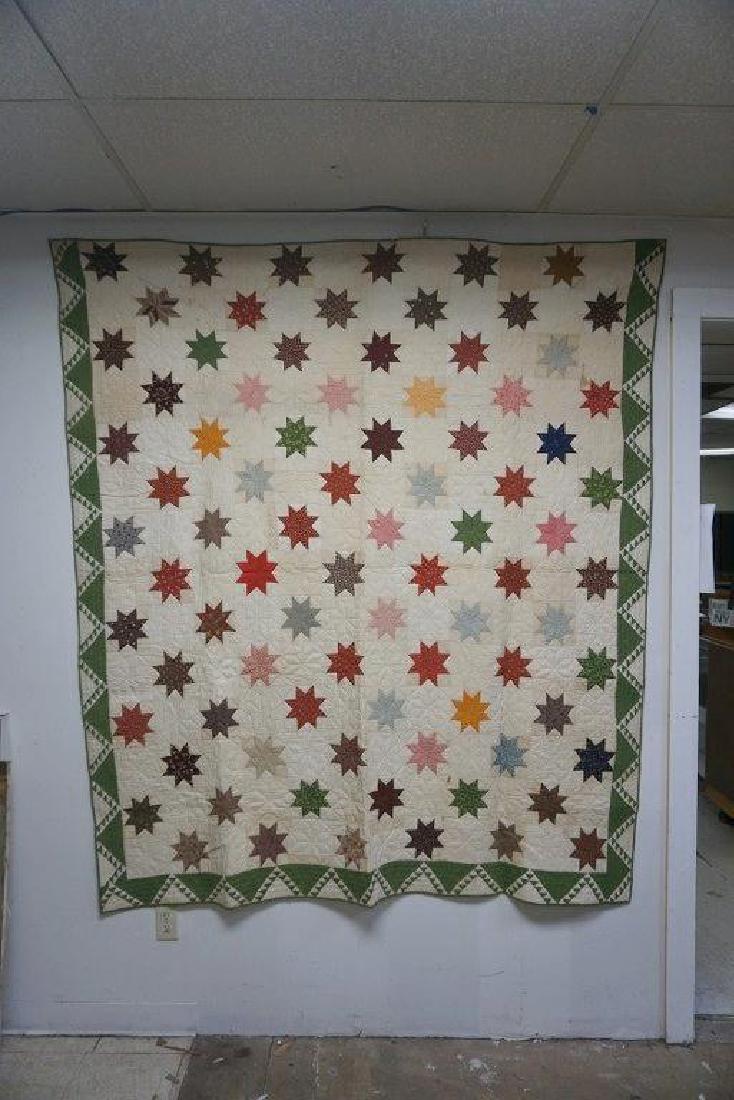 EARLY COUNTRY QUILT WITH STARS, FROM ULSTER COUNTY,: EARLY COUNTRY QUILT WITH STARS, FROM ULSTER COUNTY, N.Y. ESTATE, HAS LIGHT STAINING, MEASURES 82" X 71". NO RIPPING OR DAMAGE TO MATERIAL, OTHER THAN STAINSâ€¦.