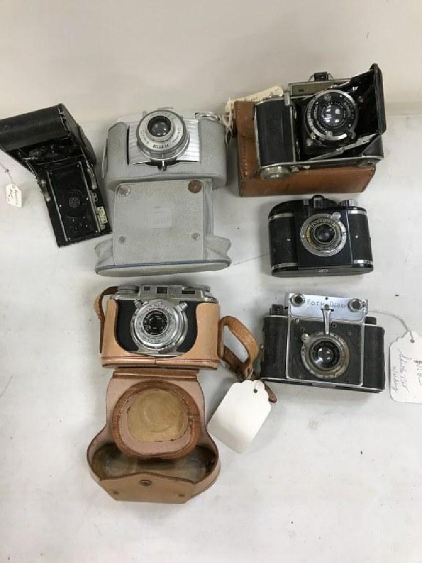 (6) NOT SO COMMON VINTAGE CAMERAS, FROM SINGLE OWNER: (6) NOT SO COMMON VINTAGE CAMERAS, FROM SINGLE OWNER COLLECTION WE ARE SELLING, INCLUDES ROLLETTE FOLDING CAMERA, BEACON, FOTH DERBY, BOLSEY B 22 , BELLA & BALDA WITH CASE.