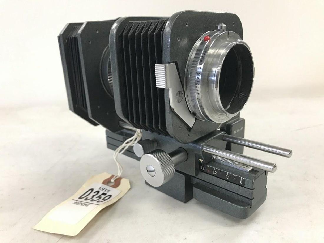 ERNST LEITZ WETZLAR LEICA BELLOWS TO FIT LEICA FLEX,: ERNST LEITZ WETZLAR LEICA BELLOWS TO FIT LEICA FLEX, APPEARS TO BE IN NEVER USED CONDITION, FROM SINGLE OWNER CAMERA COLLECTION WE ARE SELLING. ALL IN AS FOUND ESTATE CONDITION.