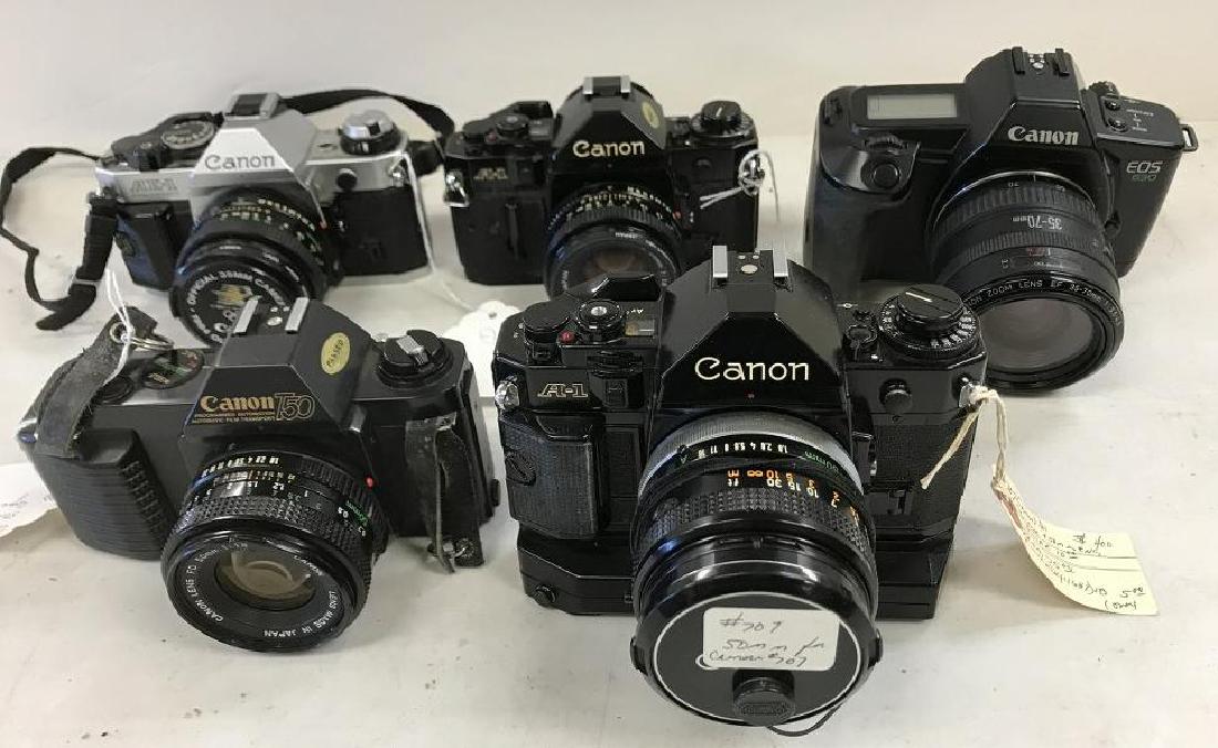 (5) CANON CAMERAS LOT INCL. AE-1 PROGRAM, EOS 630, T50,: (5) CANON CAMERAS LOT INCL. AE-1 PROGRAM, EOS 630, T50, A-1, & A-1 WITH 50MM BLACK LENS AND WINDER. ALL FROM ONE OWNER CAMERA & PHOTOGRAPHY COLLECTION WE ARE SELLING, ALL ITEMS IN AS FOUND ESTATE COND