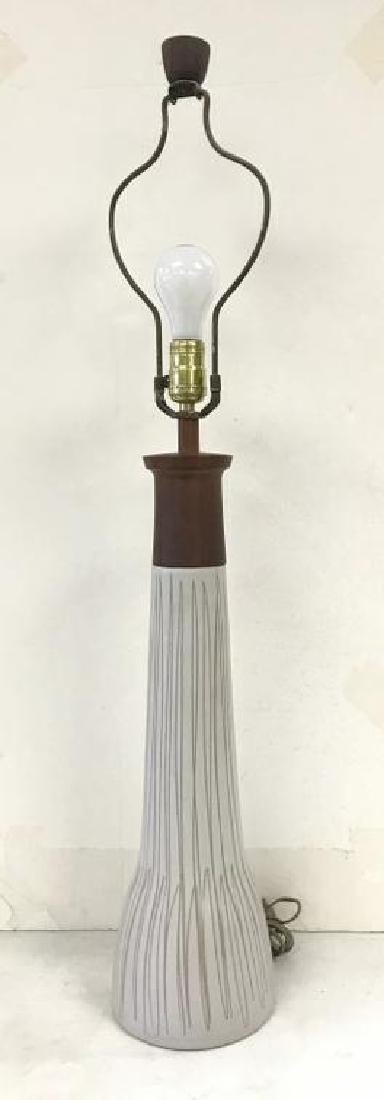 GORDON MARTZ MID CENTURY POTTERY TABLE LAMP, WITH: GORDON MARTZ MID CENTURY POTTERY TABLE LAMP, WITH PERIOD FINIAL, SIGNED ON BACK AS PICTURED. VERY NICE ESTATE FOUND CONDITION, MEASURES 35" TO TOP OF FINIAL.