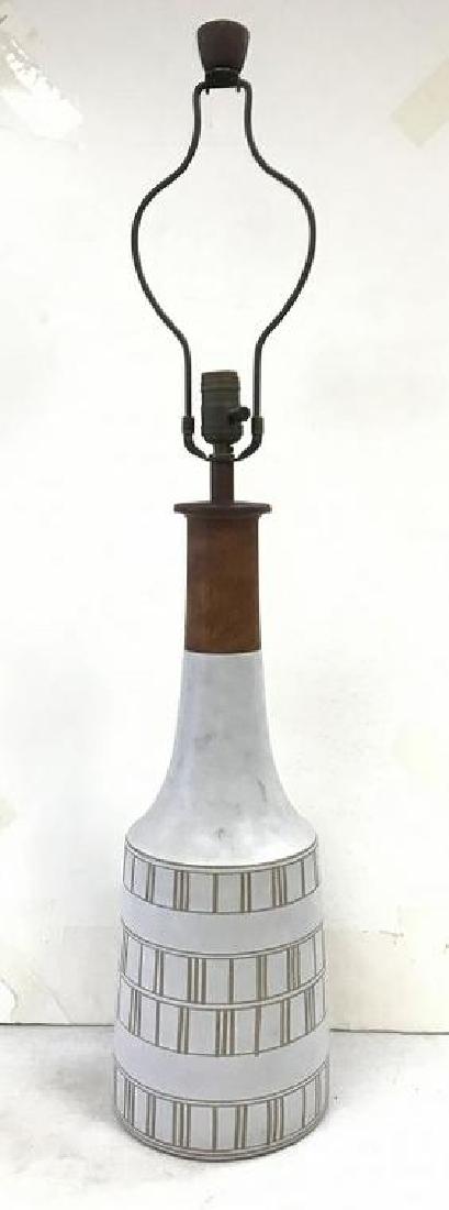 GORDON MARTZ MID CENTURY POTTERY TABLE LAMP, IN NICE AS: GORDON MARTZ MID CENTURY POTTERY TABLE LAMP, IN NICE AS FOUND ESTATE CONDITION, WITH ORIGINAL PERIOD FINIAL. MEASURES 35" TALL, FROM LOCAL HOME, PURCHASED NEW WHEN THEY GOT MARRIEDâ€¦