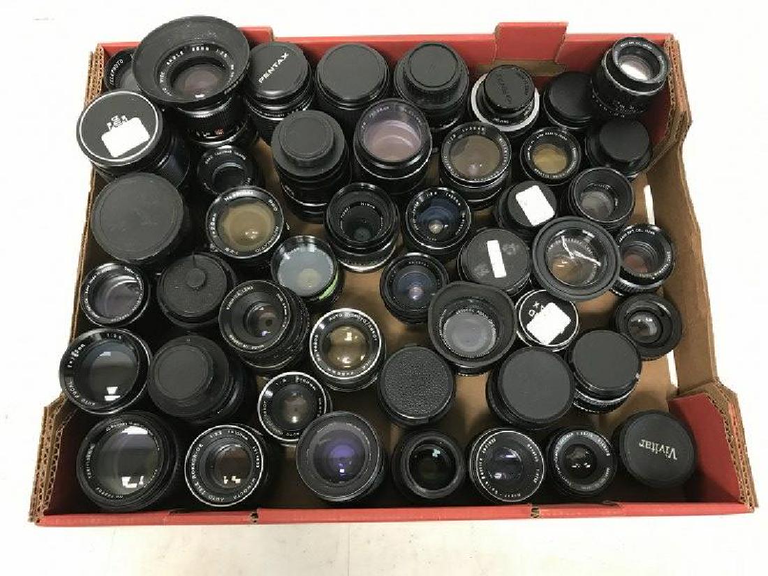 LARGE LOT OF 35 MM CAMERA LENSES, WITH A FEW: LARGE LOT OF 35 MM CAMERA LENSES, WITH A FEW CONVERTERS, FROM SINGLE OWNER CAMERA AND ACCESSORIES COLLECTION WE ARE SELLING, ALL IN AS FOUND ESTATE CONDITION. INCLUDES VIVITAR, NIKON, MAMIYA, PRO AUTO