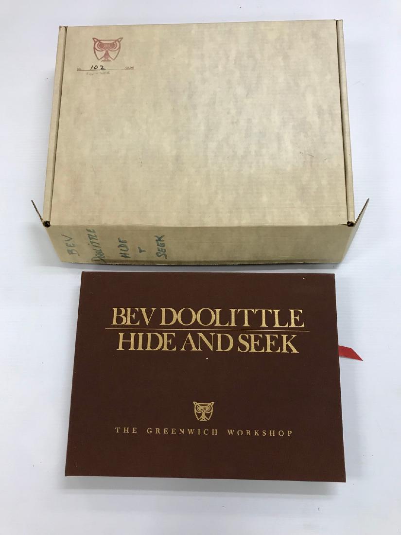 BEV DOOLITTLE HIDE AND SEEK, GREENWICH WORKSHOP, 1990.: BEV DOOLITTLE HIDE AND SEEK, GREENWICH WORKSHOP, 1990. HARDCOVER. Condition: FINE. Dust Jacket Condition: FINE. 1ST EDITION. GREENWICH WORKSHOP, 1990. 1ST EDITION. FINE/FINE. SIGNED BY AUTHOR. Greenwi