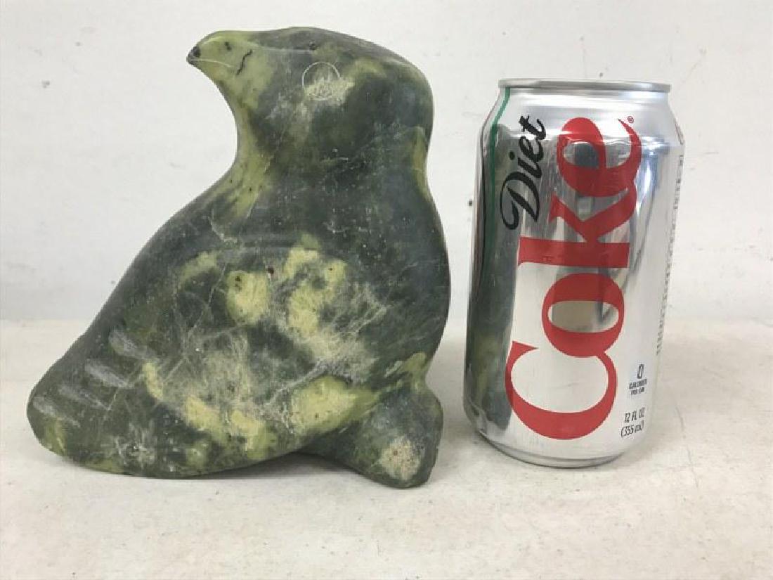 INUIT CARVED STONE BIRD, LABEL ON BOTTOM READS PARNEE: INUIT CARVED STONE BIRD, LABEL ON BOTTOM READS PARNEE CAPE DORSET #2234, MARGOT GALLERY N.Y. '81. MEASURES 6" HIGH, 5 1/2" ACROSS THE BASE. FROM THE BETTY BALLANTINE ESTATE COLLECTION, BEARSVILLE, N.Y