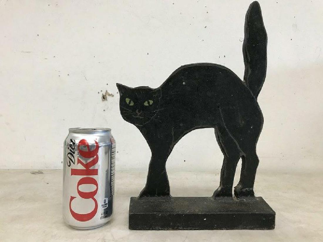 OLD CAST IRON CAT DOORSTOP, WITH PAINTED LINES AND: OLD CAST IRON CAT DOORSTOP, WITH PAINTED LINES AND EYES, MEASURES 12" HIGH AT TOP OF TAIL, FROM OLD ULSTER COUNTY ESTATE, AS PICTURED
