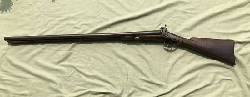 BLACK POWDER 12 GUAGE DOUBLE BARREL SHOTGUN, FROM LOCAL: BLACK POWDER 12 GUAGE DOUBLE BARREL SHOTGUN, FROM LOCAL KINGSTON ESTATE, ENGRAVED, STOCK WAS REPAIRED, AS PICTURED