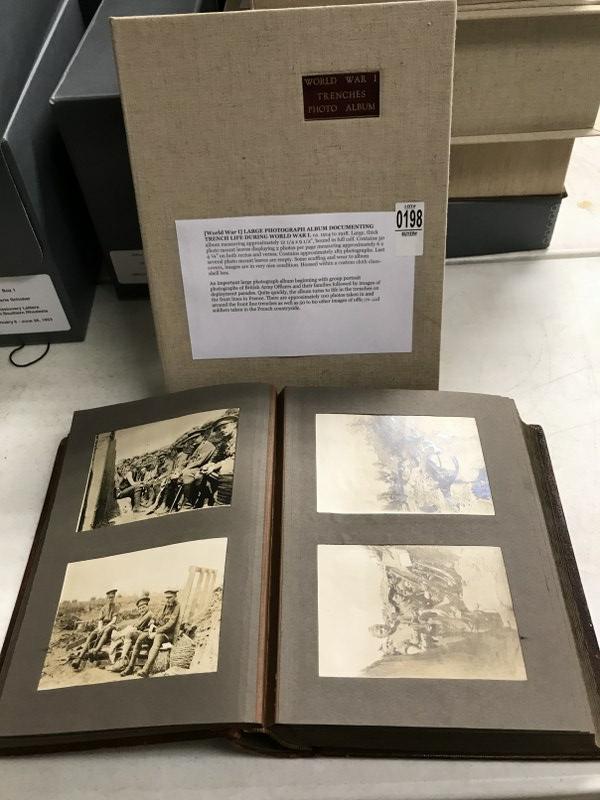 PHOTOGRAPH ALBUM OF TRENCH LIFE DURING WWI, CA. 1914 TO: PHOTOGRAPH ALBUM OF TRENCH LIFE DURING WWI, CA. 1914 TO 1918. ALBUM MEASURES APPROX. 12 1/4" X 9 1/2", BOUND IN FULL CALF.CONTAINS 50 PHOTO MOUNT LEAVES DISPLAYING 2 PHOTOS PER PAGE. CONTAINS APPROX. 