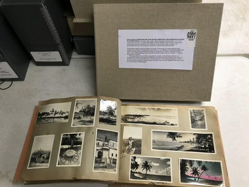 ALBUM DOCUMENTING THE ROBINSON SCHOOL IN PUERTO RICO,: ALBUM DOCUMENTING THE ROBINSON SCHOOL IN PUERTO RICO, SAN JUAN, CA. 1945-1946. ALBUM MEASURES APPROX. 12 1/2" X 9 1/2", REBOUND IN NEW COVERS. CONTAINS 261 BLACK & WHITE SNAPSHOTS, MANY WITH ACCOMPANY