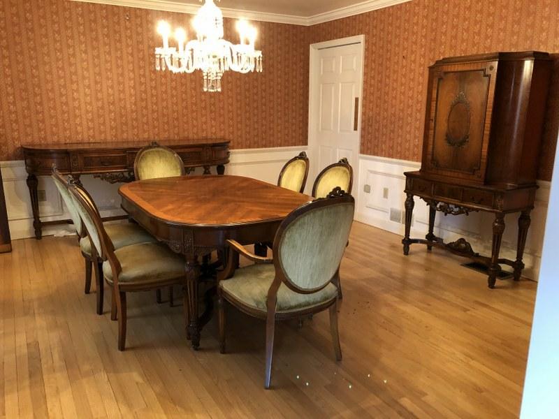 ROBERT IRWIN BEAUTIFUL 1920'S CARVED HIGHLINE DINING: ROBERT IRWIN BEAUTIFUL 1920'S CARVED HIGHLINE DINING ROOM SET, WITH BEAUTIFUL CARVINGS, LOOKS ALMOST LIKE ROSEWOOD AND SATIN WOOD, HAS TABLE, 2 LEAVES, BEAUTIFUL SIDEBOARD AND BEAUTIFUL CURVED CHINA C