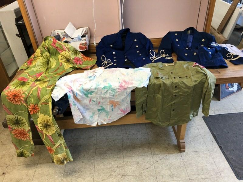 MISC. ESTATE CLOTHING LOT INCLUDING GREAT VINTAGE: MISC. ESTATE CLOTHING LOT INCLUDING GREAT VINTAGE HAWIIAN JUMPSUIT, 2 BAND JACKETS, BOY SCOUT SHIRT AND ANOTHER LIGHTWEIGHT SHIRT AS PICTURED.