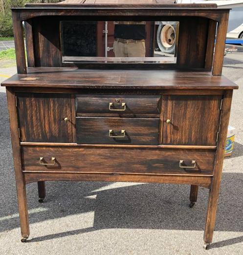 MISSION OAK SIDEBOARD WITH MIRROR, MADE BY GEORGE C.: MISSION OAK SIDEBOARD WITH MIRROR, MADE BY GEORGE C. FLINT CO., NEW YORK, SOLID, SOMEONE TRIED TO ANTIQUE PART OF IT YEARS AGO, GREAT FORM. MEASURES 54" HIGH X 45" ACROSS X 18" DEEP, FROM HUDSON VALLE