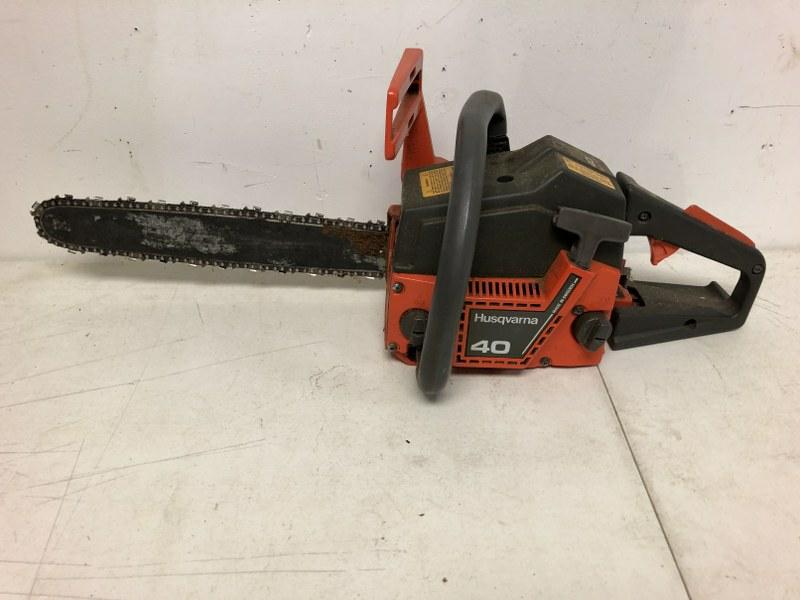 HUSQVARNA MODEL 40 CHAIN SAW, FROM LOCAL ESTATE: HUSQVARNA MODEL 40 CHAIN SAW, FROM LOCAL ESTATE WORKSHOP, HAS COMPRESSION, WHEN TRY TO PULL, THAT IS AS FAR AS I CAN TRY.