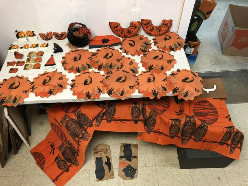 ATTIC FRESH OLD HALLOWEEN DECORATIONS IN AS FOUND: ATTIC FRESH OLD HALLOWEEN DECORATIONS IN AS FOUND CONDITION, REMARKABLE FOR ITS AGE, CREPE PAPER, CARDBOARD, AND RARE COMPOSITION HEAD BLACK CAT. ALL WERE FOLDED IN A BOX.