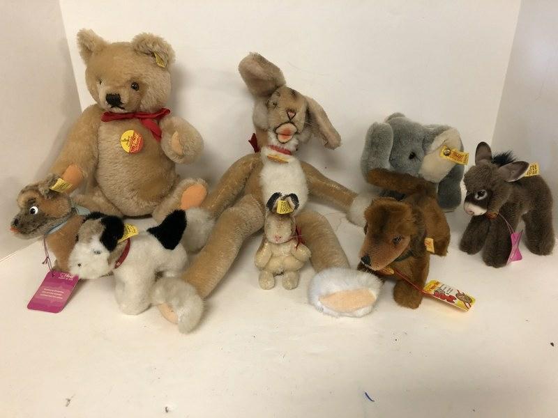 11) STEIFF ANIMALS, ALL WITH TAGS, FROM LOCAL ESTATE,: (11) STEIFF ANIMALS, ALL WITH TAGS, FROM LOCAL ESTATE, INCLUDES HEXIE, ASSY, SNALL BUNNY, COSY JUMBO, SMALL WHITE DOG, BROWN DOG, BEAR, AND LULAC LARGE RABBIT. ALL IN GOOD ESTATE CONDITION.FOUND 3 MOR