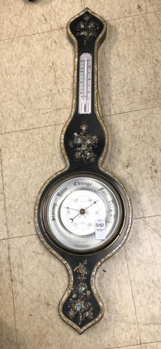 SHORTLAND AND SMITHS BAROMETER, HAS DECORATIVE MOTHER: SHORTLAND AND SMITHS BAROMETER, HAS DECORATIVE MOTHER OF PEARL INLAY AROUND BORDER AND ON MAIN TOP BODY. SOME SMALL PIECES OF THE BORDER OFF, DOESN'T FFECT OVERALL APPEARANCE. MEASURES 36" TOP TO BOTT