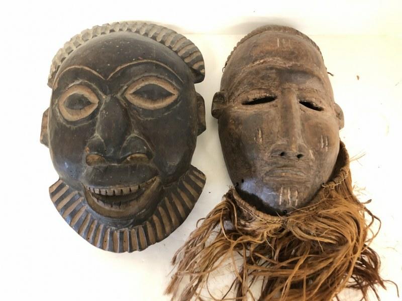 (2) OLDER AFRICAN MASKS, UNSURE OF ORIGIN, NICE PATINA,: (2) OLDER AFRICAN MASKS, UNSURE OF ORIGIN, NICE PATINA, MEASURE 13.5" AND 12" TOP TO BOTTOM, ONE WITH BEARD IS SHEDDING THE MATERIAL. FROM HUDSON VALLEY ESTATE.