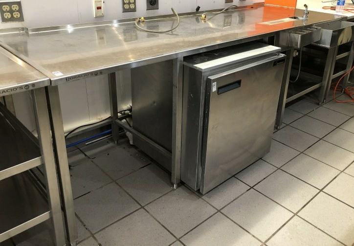 102" WIDE STAINLESS WORK TABLE, SHELF UNDERNEATH,: 102" WIDE STAINLESS WORK TABLE, SHELF UNDERNEATH, FAUCET AND DRAIN ON TOP, AND 2 UTENSIL HOLDERS. MEASURES 102" WIDE X 34.5" HIGH X 34.25 . THIS LOCATION IS LOCATED AT 295 WALL STREET, KINGSTON, NEW Y