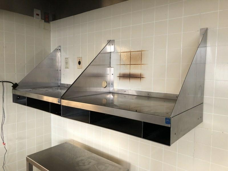 2 STAINLESS STEEL HANGING SHELVES WITH COMPARTMENTS.: 2 STAINLESS STEEL HANGING SHELVES WITH COMPARTMENTS. BOTH MEASURE 60" WIDE. MADE BY NSF. THIS LOCATION IS LOCATED AT 575 BROADWAY, KINGSTON, NEW YORK 12401, IT CAN BE PREVIEWED BY APPOINTMENT ONLY (84