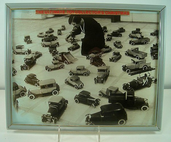 PHOTO-WOMAN W/OLD PRESSED STEEL CARS & TRUCKS, PHOTO ME: PHOTO-WOMAN W/OLD PRESSED STEEL CARS & TRUCKS, PHOTO MEASURES 11" X 14", GREAT PHOTO FOR TOY COLLECTOR