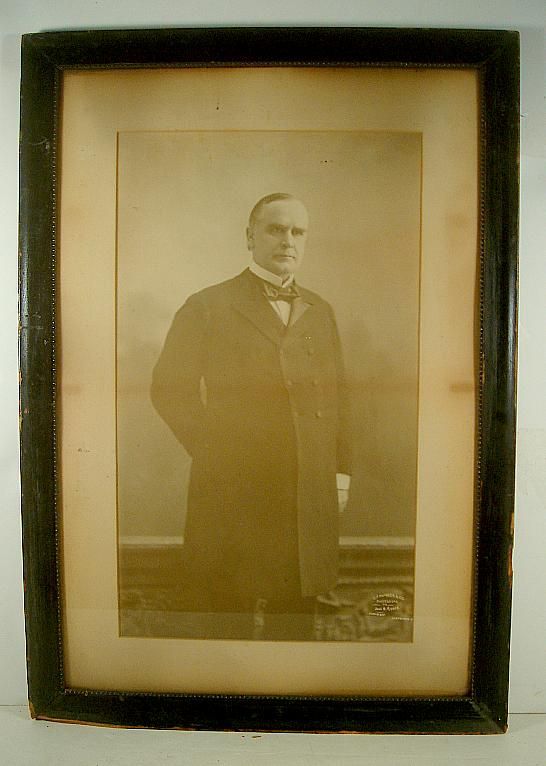 LARGE EARLY PRESIDENT MCKINLEY PHOTOGRAPH, MEASURES 21": LARGE EARLY PRESIDENT MCKINLEY PHOTOGRAPH, MEASURES 21" X 12". ON LOWER RIGHT CORNER IS C.F.HUNGER & CO. SUCCESSORS TO JOHN H. RYDER CLEVELAND, OHIO. VERY LIGHT FOXING LINE THROUGH CENTER.