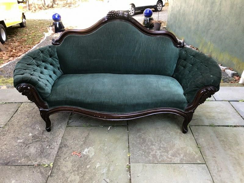 VICTORIAN CARVED SOFA , NICE SMALLER SIZE, TUFTED: VICTORIAN CARVED SOFA , NICE SMALLER SIZE, TUFTED SIDES, GREEN VELVET MATERIAL IS IN GOOD CONDITION, FROM DUTCHESS COUNTY HOME, NICE AND CLEAN. MEASURES 73" WIDE..