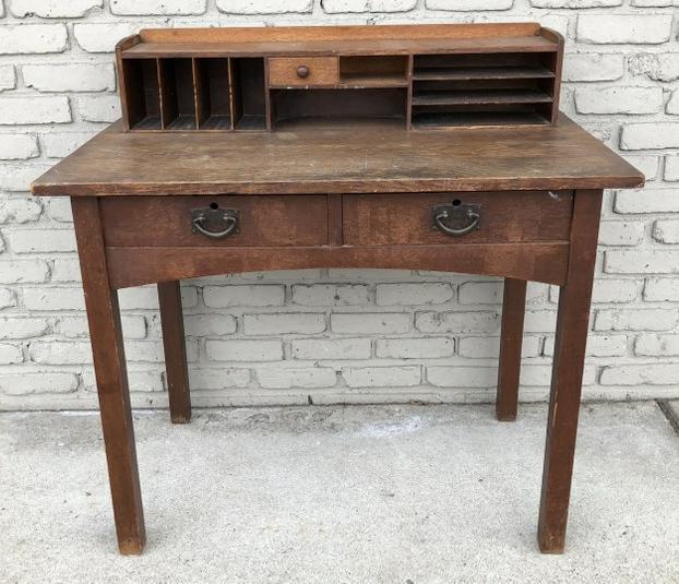 GUSTAV STICKLEY 2 DRAWER POSTCARD DESK, CIRCA 1912.: GUSTAV STICKLEY 2 DRAWER POSTCARD DESK, CIRCA 1912. FOUND IN LOCAL HUDSON VALLEY ESTATE, MISSING ONE OF THE GALLERY SMALL DRAWERS, BOTH DRAWER LOCKS MISSING, WEAR TO FINISH, STRUCTURALLY SOUND. MEASUR