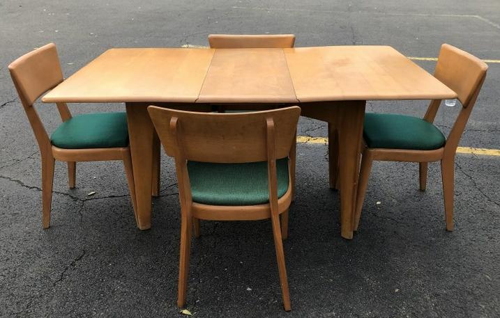 HEYWOOD WAKEFIELD LONG DROP LEAF DINING TABLE WITH 4: HEYWOOD WAKEFIELD LONG DROP LEAF DINING TABLE WITH 4 CHAIRS, CHAMPAGNE COLOR, FROM ALBANY, N.Y. ESTATE, NICE CONDITION, ALL STRUCTURALLY SOUND. OPEN ALL WAY TABLE MEASURES 61" X 36".