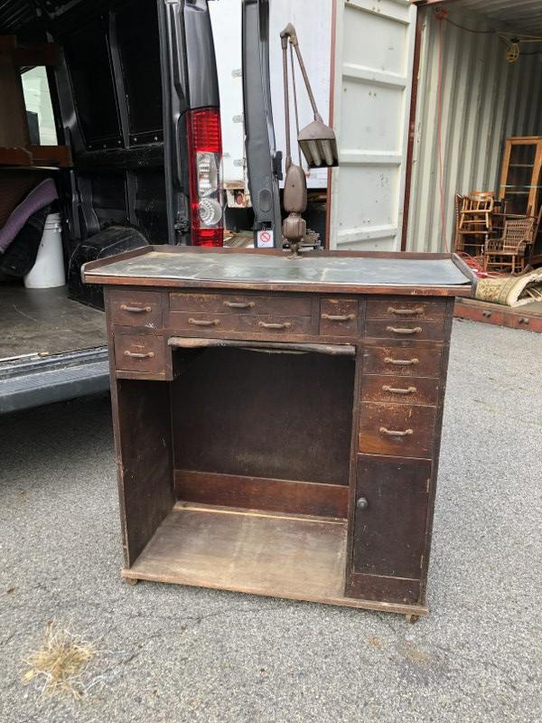 OLD JEWELERS WATCH MAKERS WORK BENCH WITH LIGHT, AND: OLD JEWELERS WATCH MAKERS WORK BENCH WITH LIGHT, AND OLD TRAYS AND ACCESSORIES THAT WERE FOUND WITH IT, FROM NYC ESTATE ORIGINALLY. GOOD LOOKING, MEASURES 41" HIGH X 40.5" WIDE X 20" DEEP.