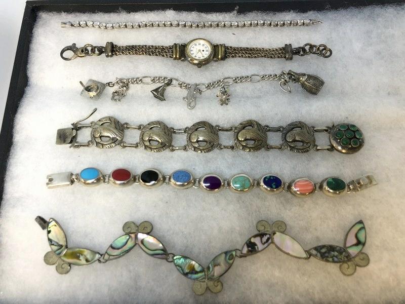 (6) VINTAGE STERLING BRACELETS AND WATCH BAND, FROM: (6) VINTAGE STERLING BRACELETS AND WATCH BAND, FROM LOCAL ESTATE, GOOD CONDITION. INCLUDES CHARM, BUTTERFLY WITH INLAY, WITH STONES, ETC.