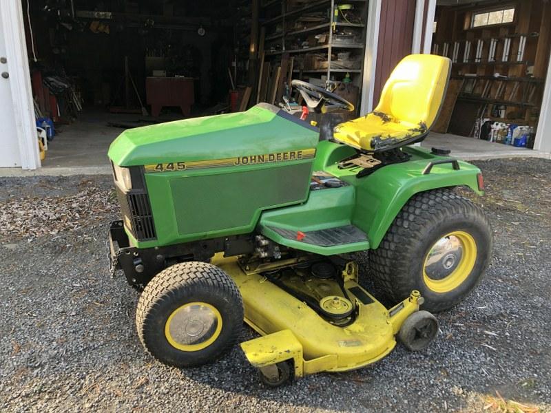 JOHN DEERE 445 TRACTOR, RUNNING GOOD, USED TO MOW THE: JOHN DEERE 445 TRACTOR, RUNNING GOOD, USED TO MOW THE PROPERTY RIGHT UP TILL HIS PASSING. 1170 HOURS ON GAUGE. SEAT HAS TEARS. BODY IN NICE CONDITION, ALWAYS KEPT INSIDE GARAGE. ALL ITEMS FROM THIS ES