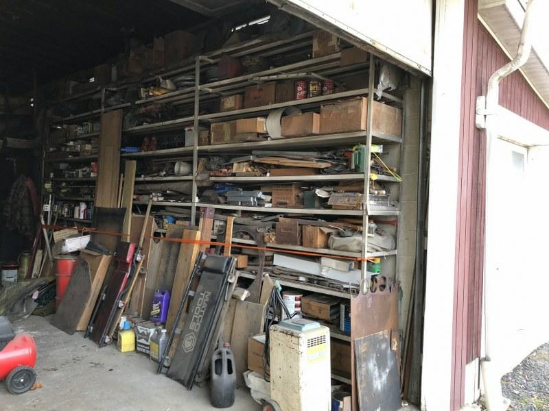 HUGE SHELVES OF OLD CAR AND TRUCK ASSORTED PARTS, 4: HUGE SHELVES OF OLD CAR AND TRUCK ASSORTED PARTS, 4 CREEPERS, ACCESSORIES, BATTERY CHARGER, AND MUCH MORE STORED UP THERE FOR MANY YEARS. ALL ITEMS FROM THIS ESTATE WILL BE SOLD IN PLACE, AND LEFT THE