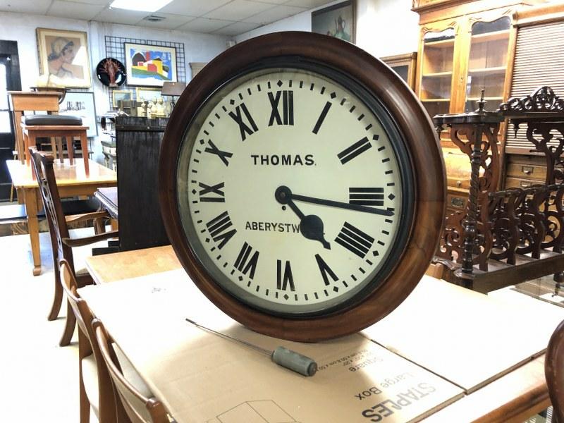 WONDERFUL LARGE THOMAS ABERYSTWTH WALL CLOCK, WITH: WONDERFUL LARGE THOMAS ABERYSTWTH WALL CLOCK, WITH PENDULUM, VERY NICE ESTATE CONDITION, MEASURES 28.5" ACROSS AND HANGS 28" DOWN. TERRIFIC LOOKING CLOCK, MOVEMENT INSIDE LOOKS NICE AND CLEAN, WAS HAN