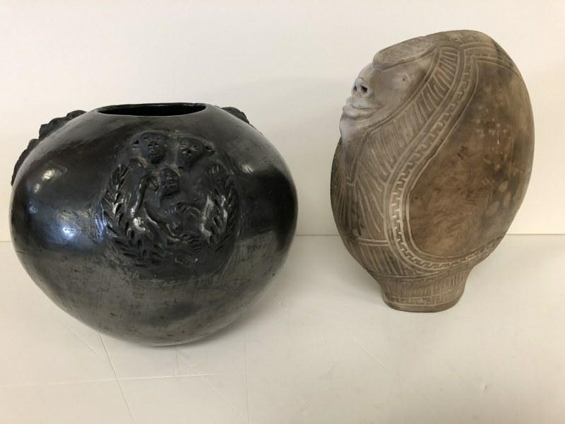 (2) PCS. ART POTTERY FROM HUDSON VALLEY HOME, INCLUDING: (2) PCS. ART POTTERY FROM HUDSON VALLEY HOME, INCLUDING STATUE WITH FACE SIGNED H MCELROY 1982, MEASURES 12" HIGH AND 11" LONG, THE BLACK ROUNDED BOTTOM VASE WITH MONKEY FACES MEASURES 9" HIGH AND 11"